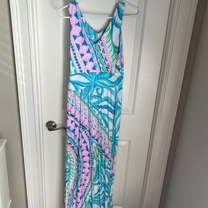 Brightly colored cotton maxi dress has a cinched waist for flattering fit